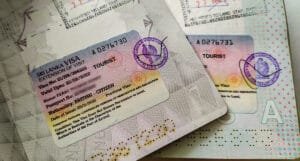 Close-up shot of a two visas inside passports